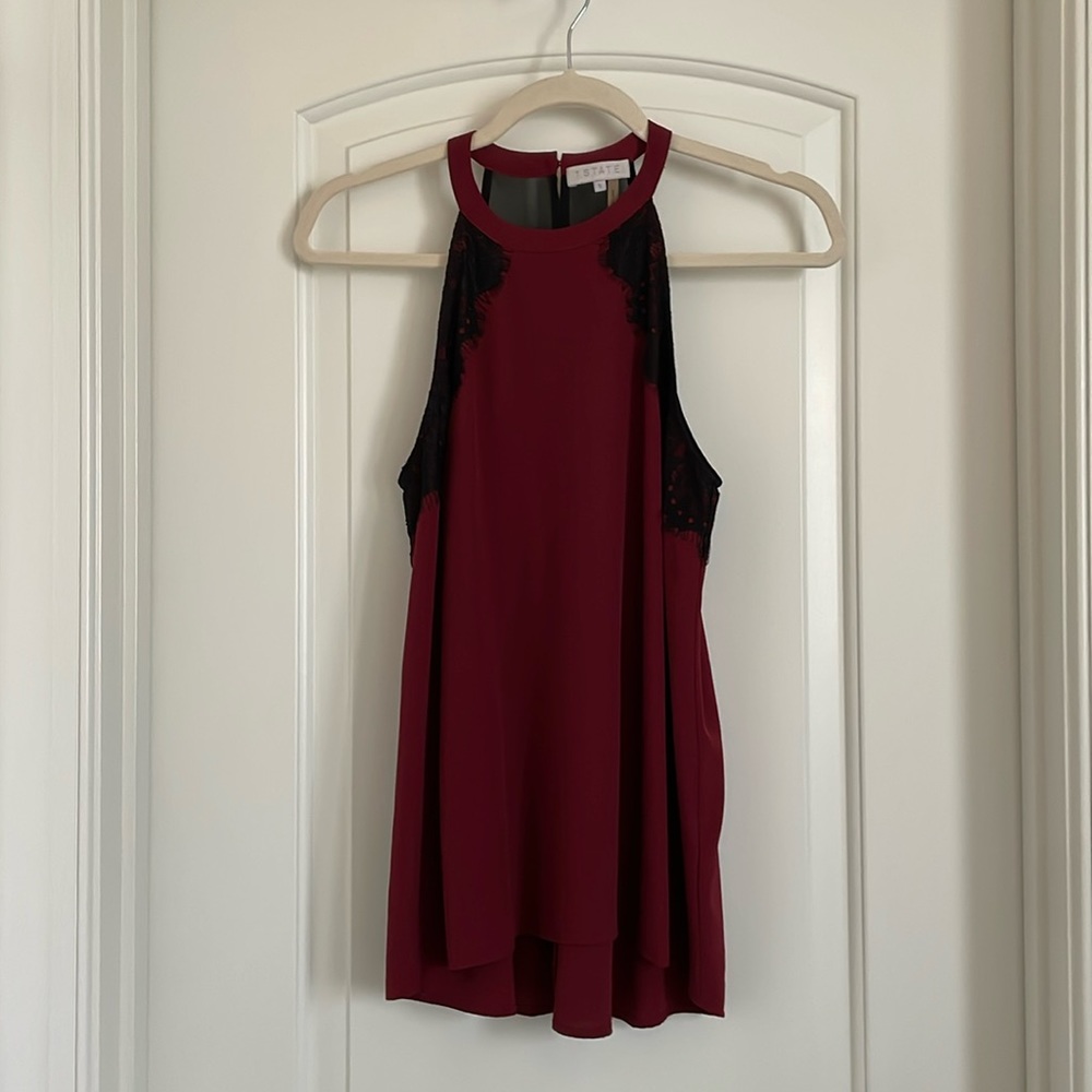 Burgundy blouse with black lace detail and sheer back